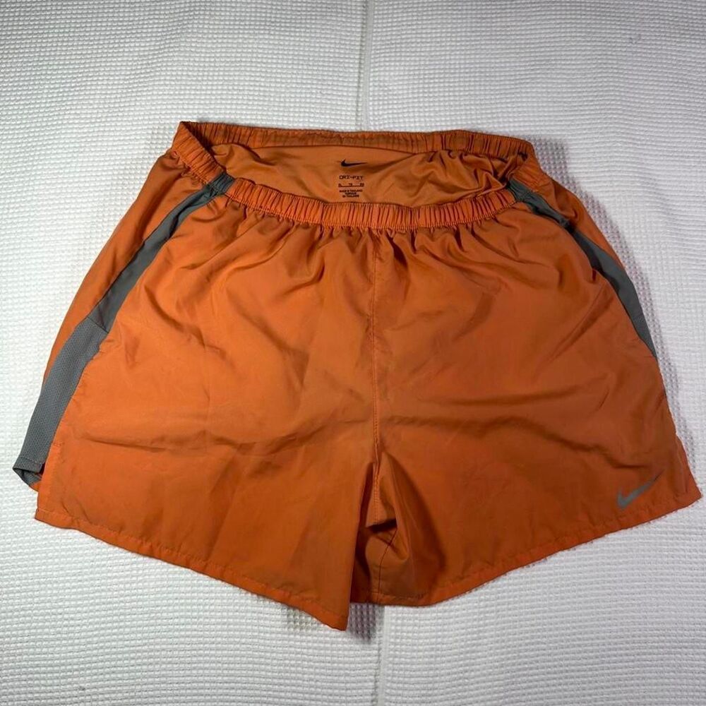 Women’s Nike Dri-Fit orange running shorts size L